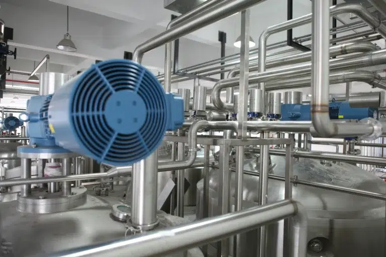 Engineer reviewing piping system design drawings